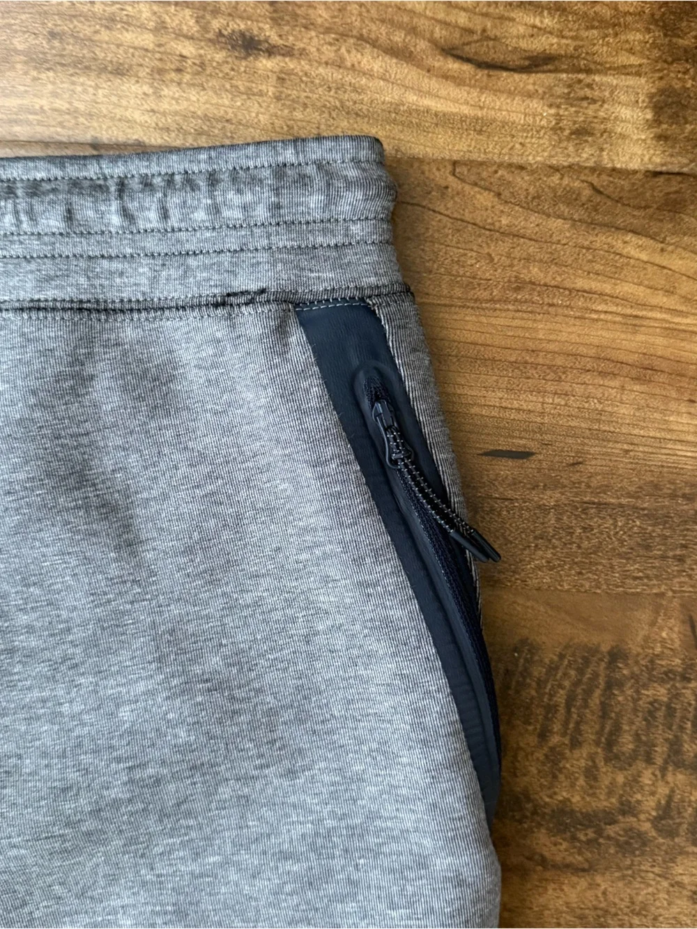 Gray Nike Tech Fleece Joggers with black side stripe
